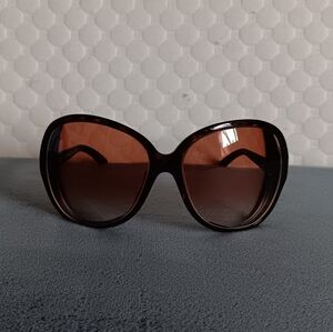 Prada Sunglasses, slight scratch, brown